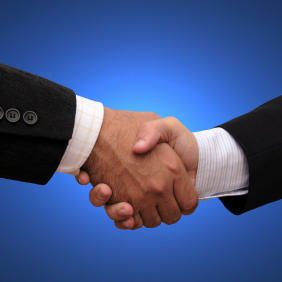business sale handshake with broker